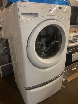 Whirlpool front load washer with pedestal in excellent conditions with 4 months warranty