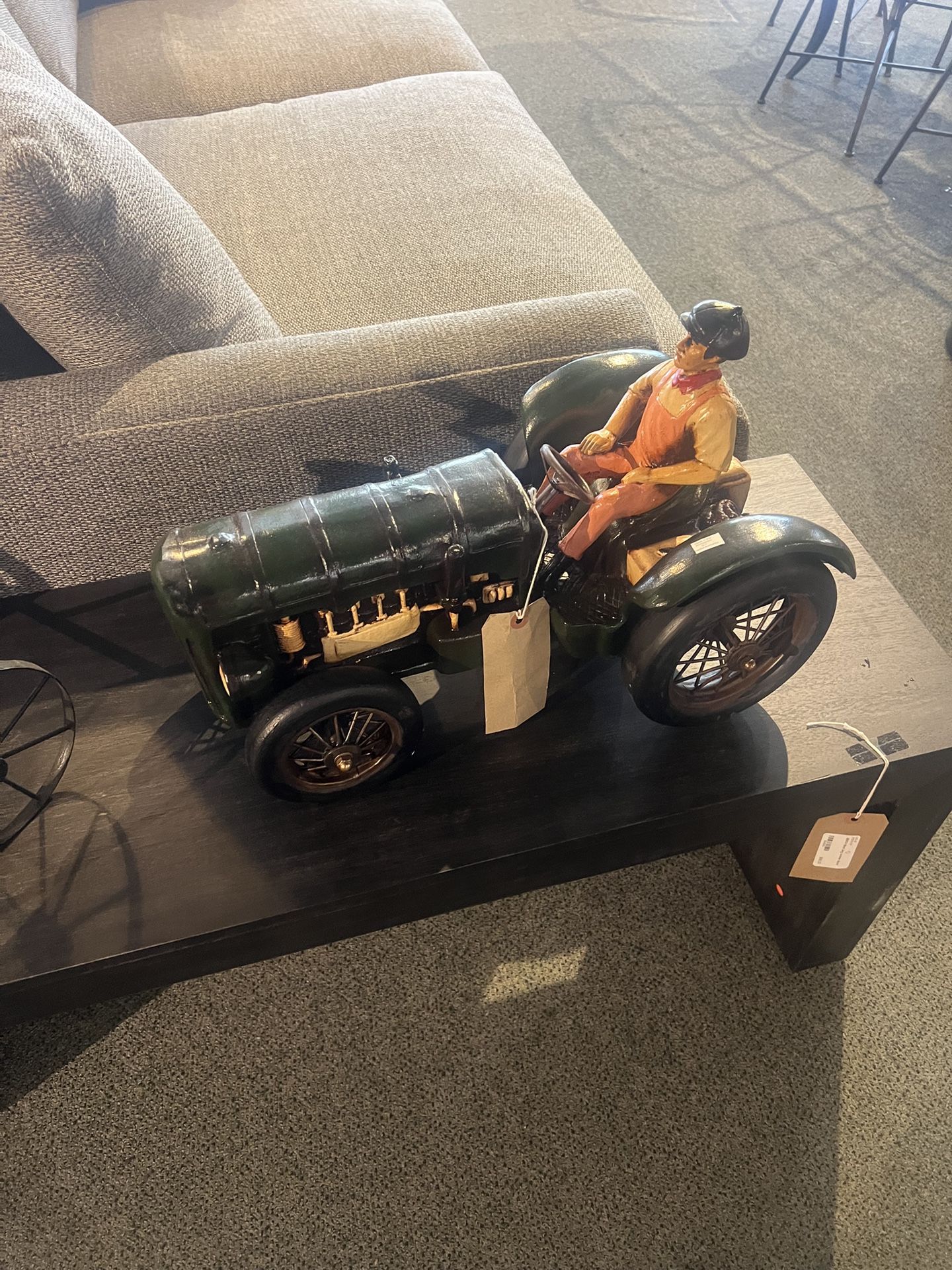 DECOR:  Man Riding a Dark Colored Tractor SKU LAV29L