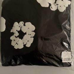 Black and white denim tear