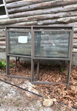 2- Never used aluminum-framed Harvey Insulated windows—39” x 58”