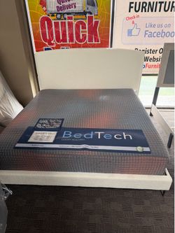 Upholstered white platform king bed frame
