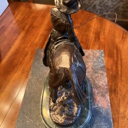 Frederick Remington “ The Outlaw" Statue with a Marble  Base