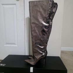 Tall dress boots, worn once, in good condition, size 9.5.