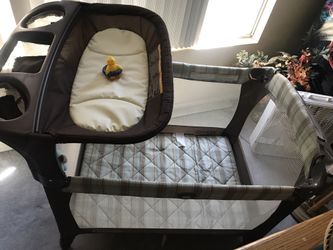 Nearly new - Graco Pac and Play with changing table and storage - nearly new