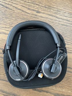 Plantronics C520-M USB headphones. Never been used. Case included.