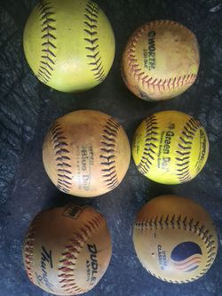 Six Softballs (various brands)