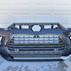 Toyota Grand Highlander Bumper complete with grill - black polish, upper and lower bumper, center and side molding, Complete Bumper Assembly, OEM ORIG