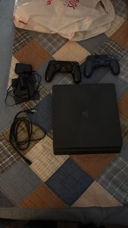 PS4 w/ 2 controllers and dual charger