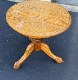 Round wooden oak side table