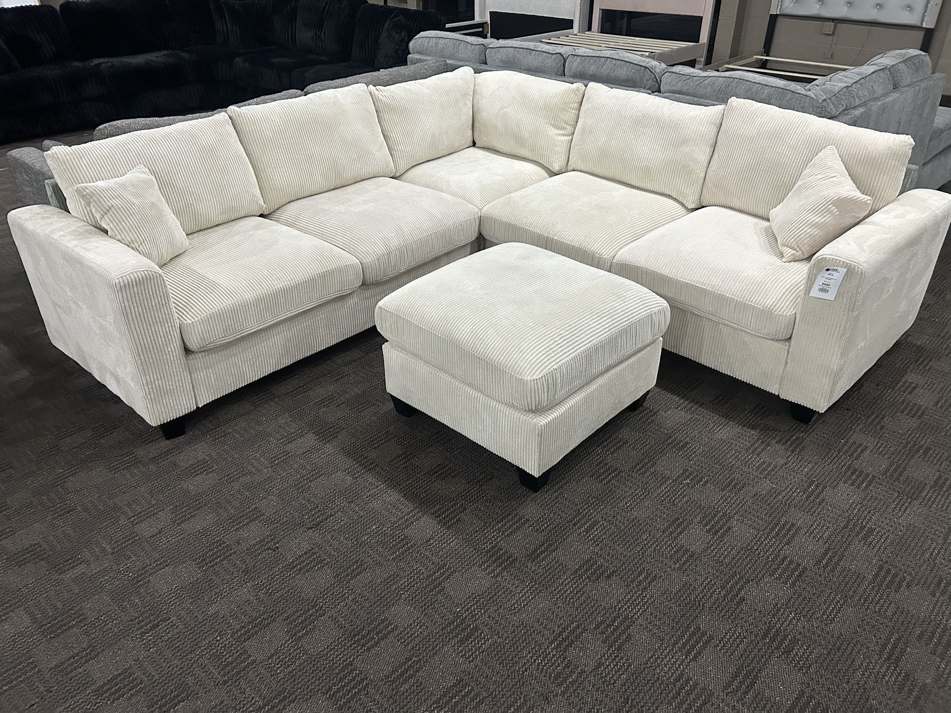 Cream L Shape sectional with ottoman