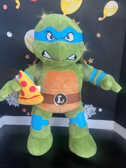 TMNT LEONARDO 16 INCH BAB WITH HIS SLICE OF PIZZA REMOVABLE SHELL