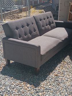 Futon style sofa back goes down