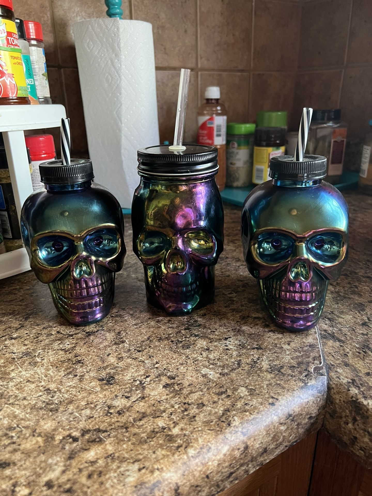 3 Chrome Skull cups the one in the middle is glass the other two plastic $4 for all 3