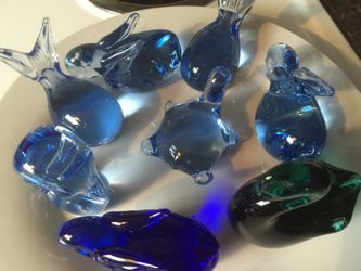 Figurines, figurines, figurines, all glass.
