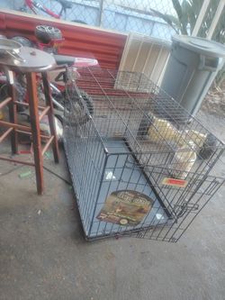 Dog crate it's never been used but box got torn apart