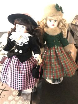 Porcelain dolls new with tags $60 for both