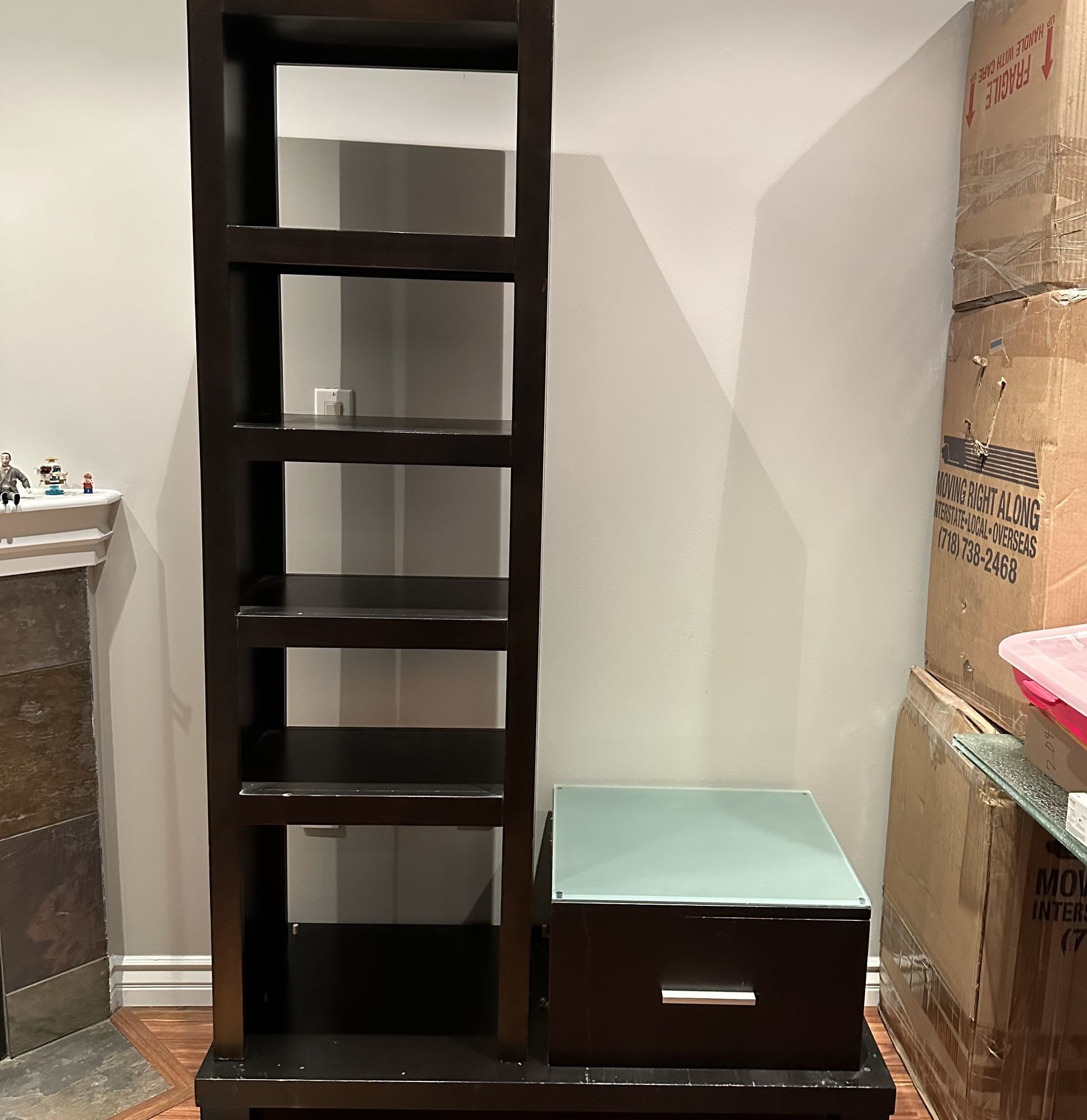 Frosted glass side table with attached book shelf 