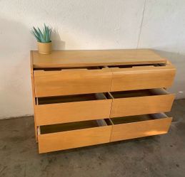 Curved wood dresser