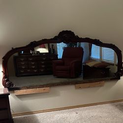🪞Antique Bar Mirror. This sold mahogany mirror hung in a London England Pub in the mid 1800s.  My parents purchased it from an antique shop in London
