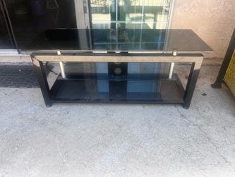 Glass tv entertainment center