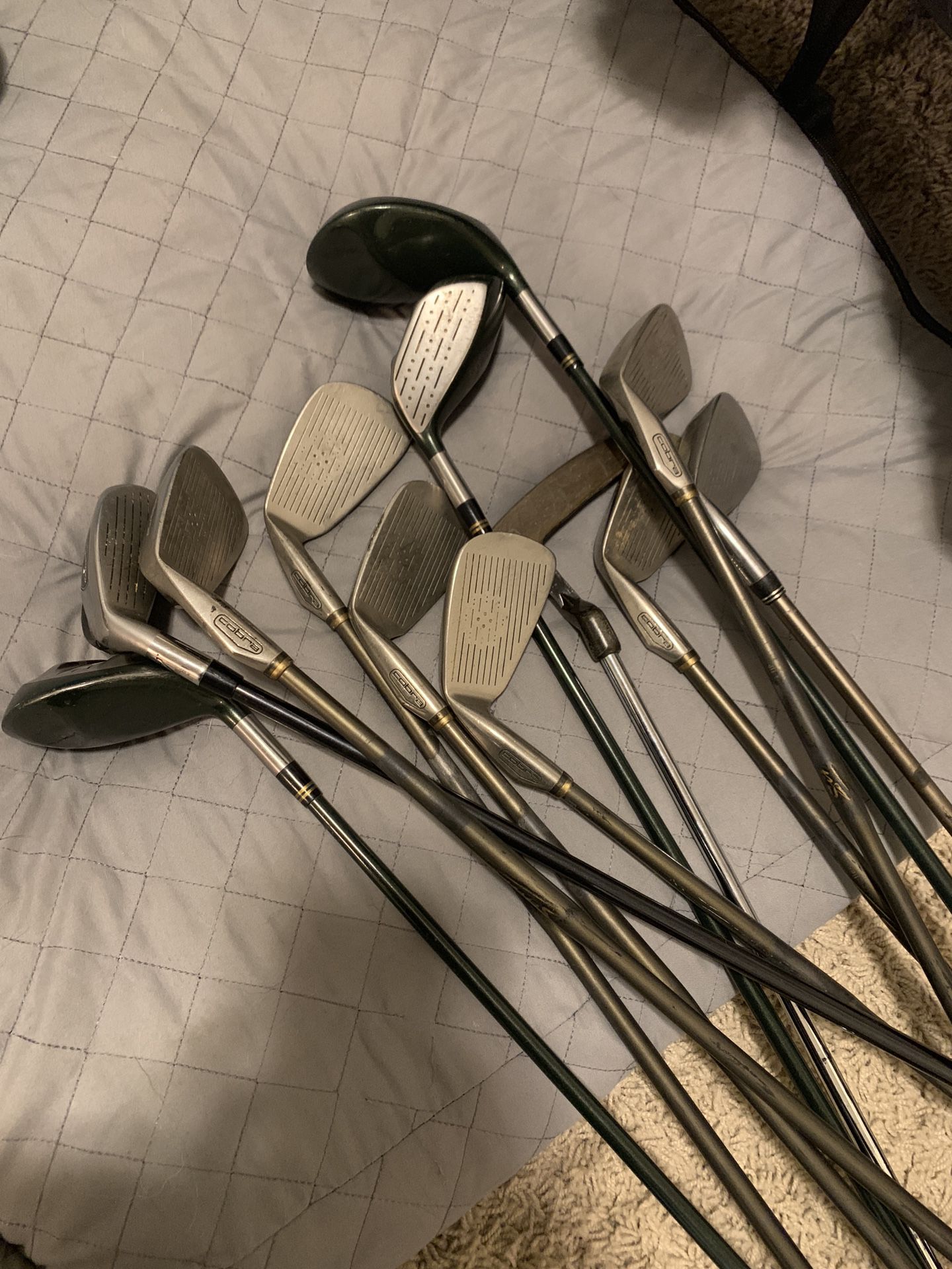 Set of 11 Golf clubs