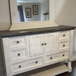 Solid wood dresser with six drawers and two doors, and mirror