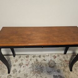 Table with a narrow tabletop