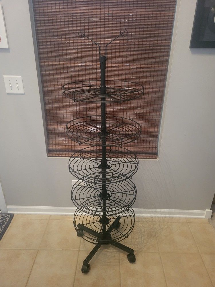 Display Rack With 5 Rotating Shelves And Locking Casters. 