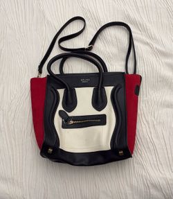Beautiful Red/ black off white tricolor luggage tote  bag .