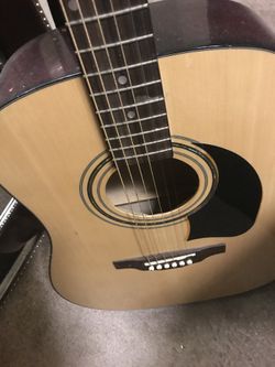 Lyon guitar with capo and strings