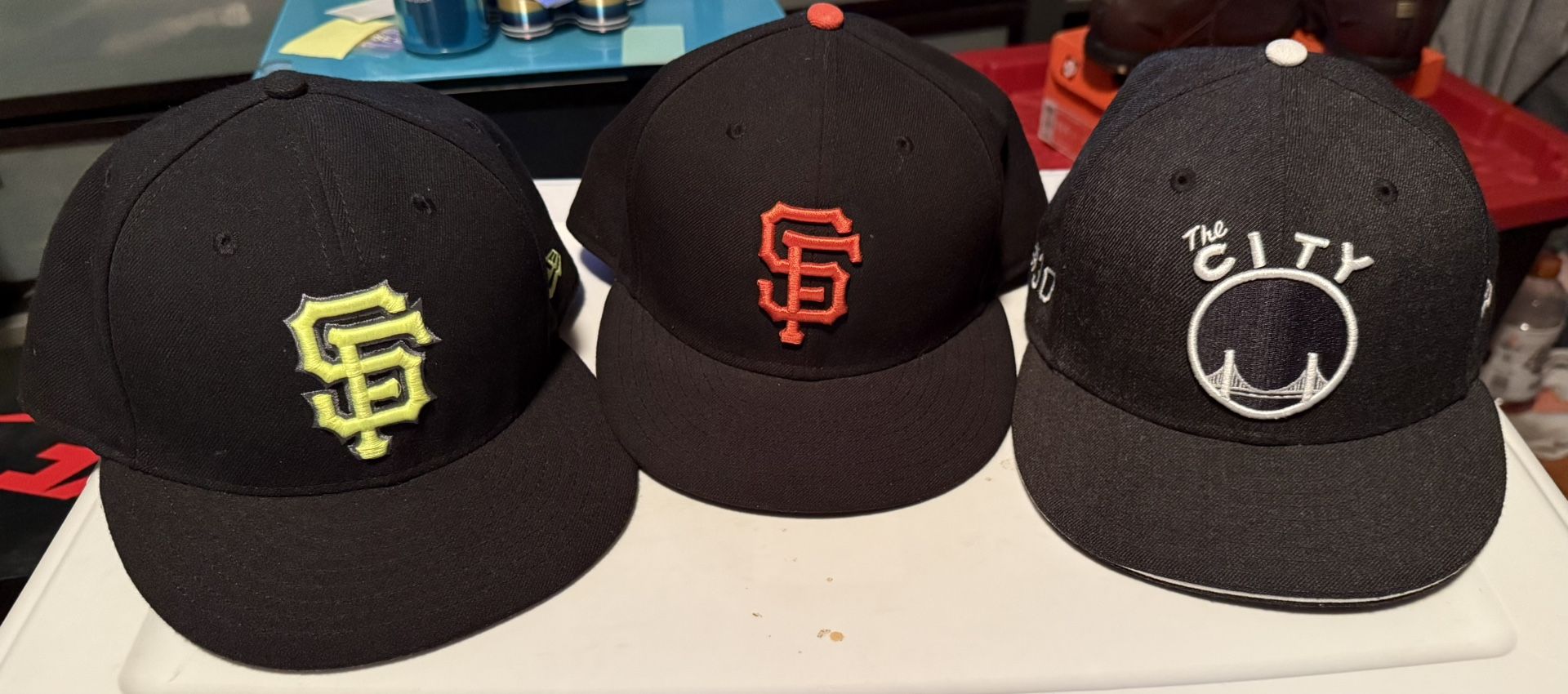 New Era Hats 7 5/8. Giants and Warriors.