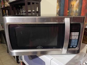 Oster 1100w 1.3 Cu Ft Microwave