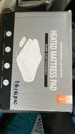 Heated mattress pad