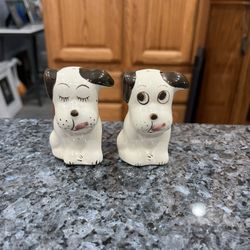 Vintage Pottery Rio Hondo Dog Pair of Salt and Pepper Shakers.  Size approximately 3 inches tall.  Preowned no stoppers.  