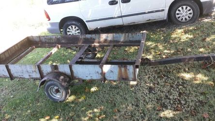 This is a specially made trailer that fits a 4x8 sheet of plywood.