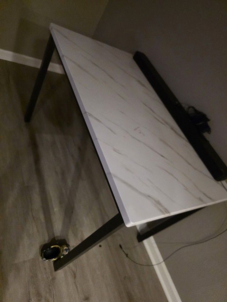 White Marble And Black Dining Table