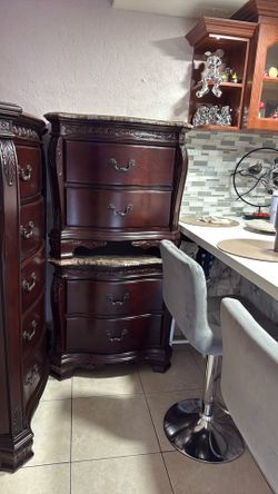 Room to go wood marble tops night stands set value 750
