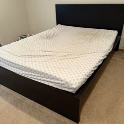 IKEA queen mattress with bed frame and tempurpedic topper.