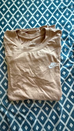 Brown Nike shirt