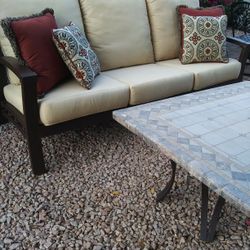 Mallin Patio Furniture - Sofa With Sunbrella Cushions & A Natural Stone Coffee Table