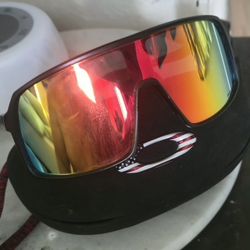Oakley Sunglasses – Red Iridium Lens, Black Frame