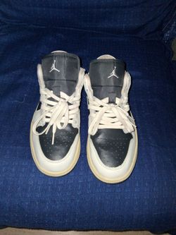 Air Jordan 1 Mid White and Black Sneakers