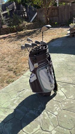 with c complete set of golf club titliest driver nice putter with cobra bag lots of ball rain cover include very good condition