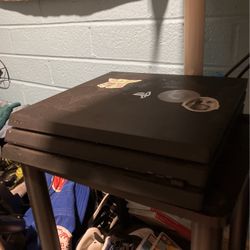 ps4 with games,headset,controllers,and moniter