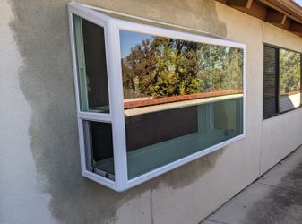 Vinyl Wimdows And Sliding Doors