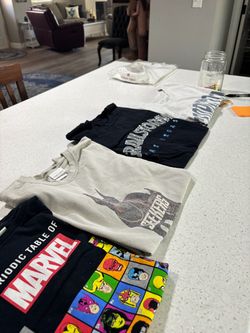 Four medium T-shirts all for $15
