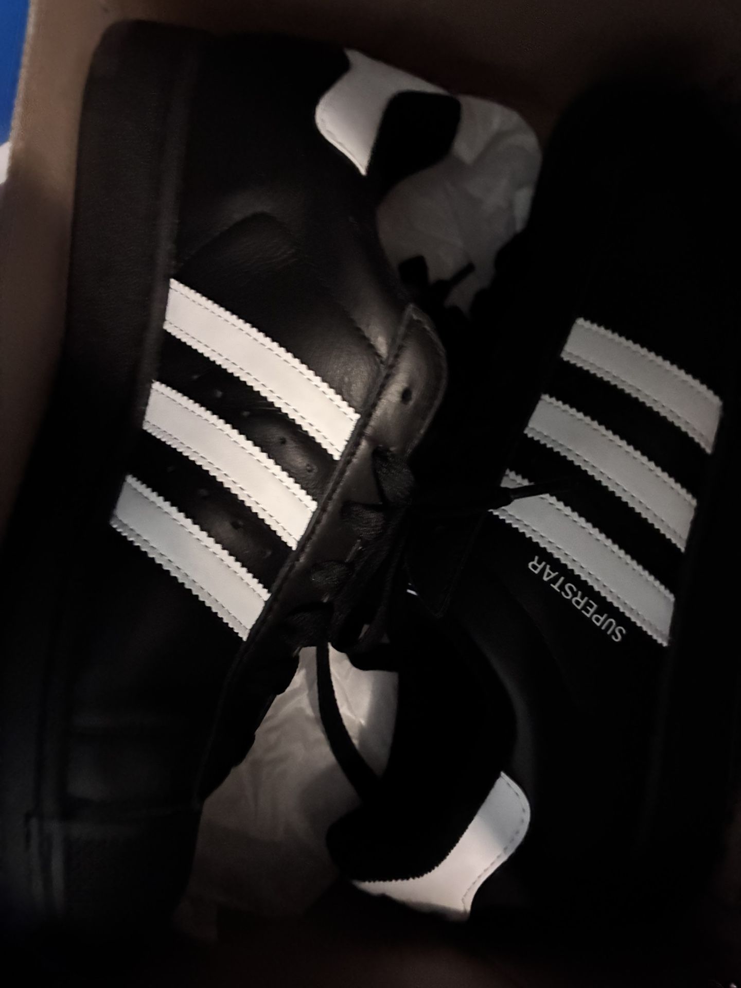 Black Adidas Superstars 