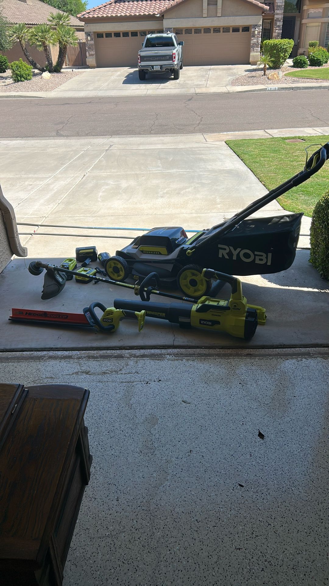 Bunch Of Ryobi Yard Equipment With Lawn Mower