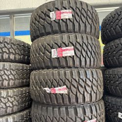33X12.50R22 SET OF 4 MUD TIRES WITH INSTALLATION AND BALANCING 