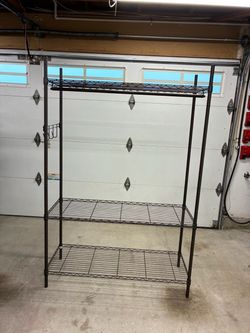 Wire shelving with clothes bar $25 or best offer